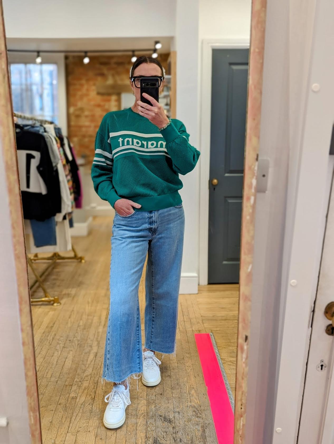 Zoie wearing Marant Étoile Arwen Emerald Open-Knit Sweatshirt at 32 the Guild