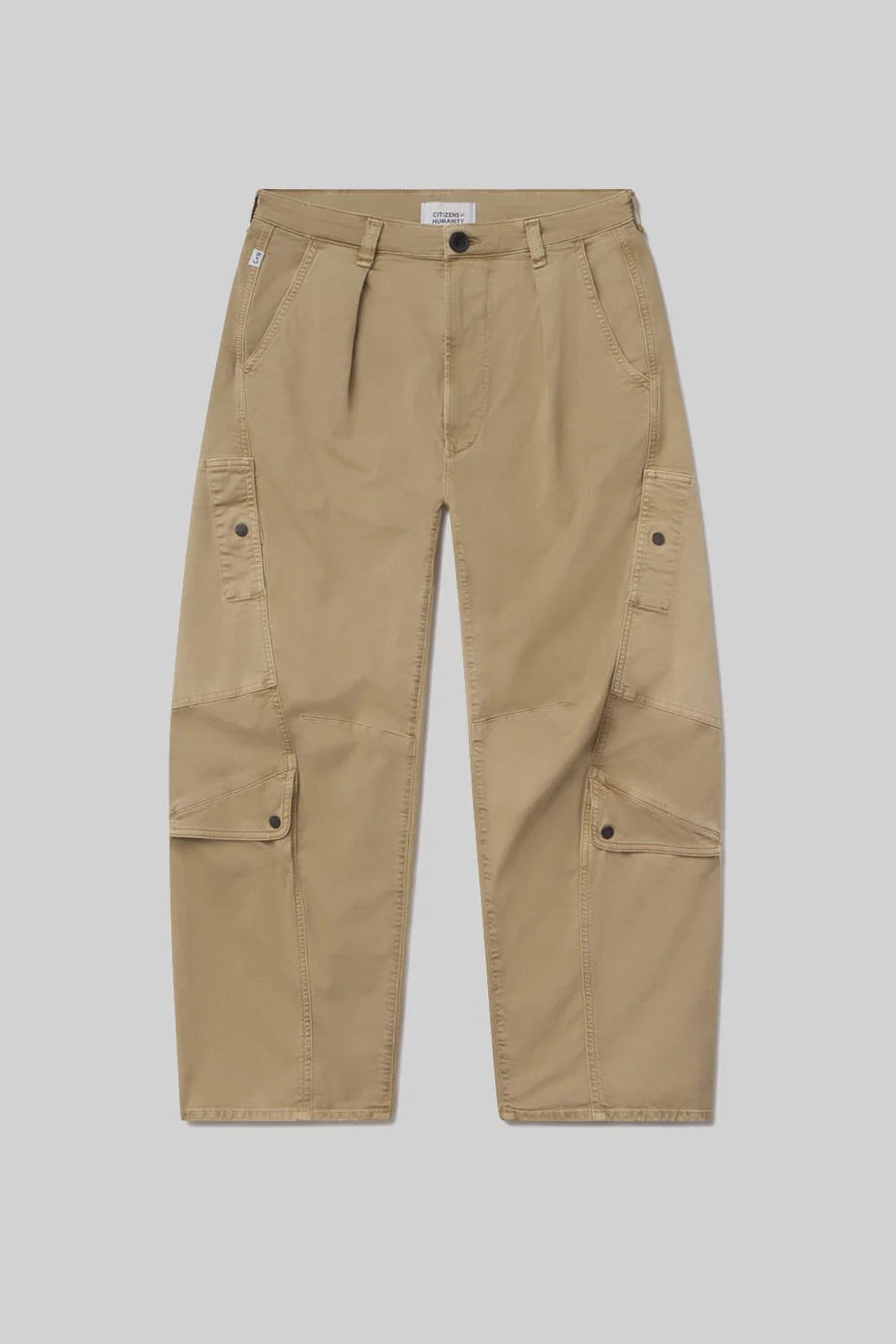 A pair of beige cargo pants with pleated front legs, side cargo pockets with snap buttons, and belt loops, shown flat on a light gray background.