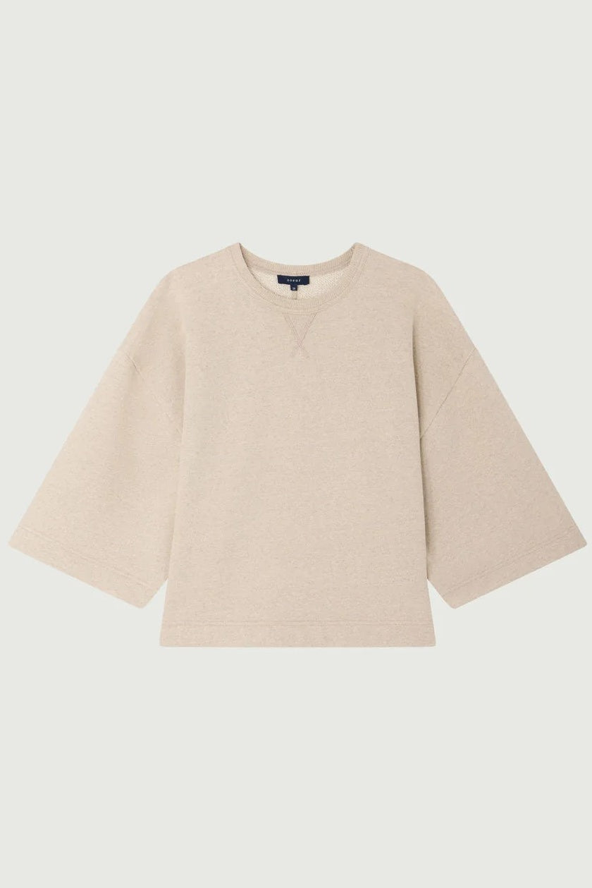 Beige sweater on a light gray background