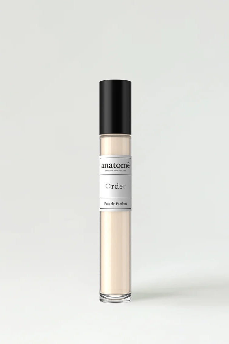 Perfume bottle labeled 'anatome' on a white background