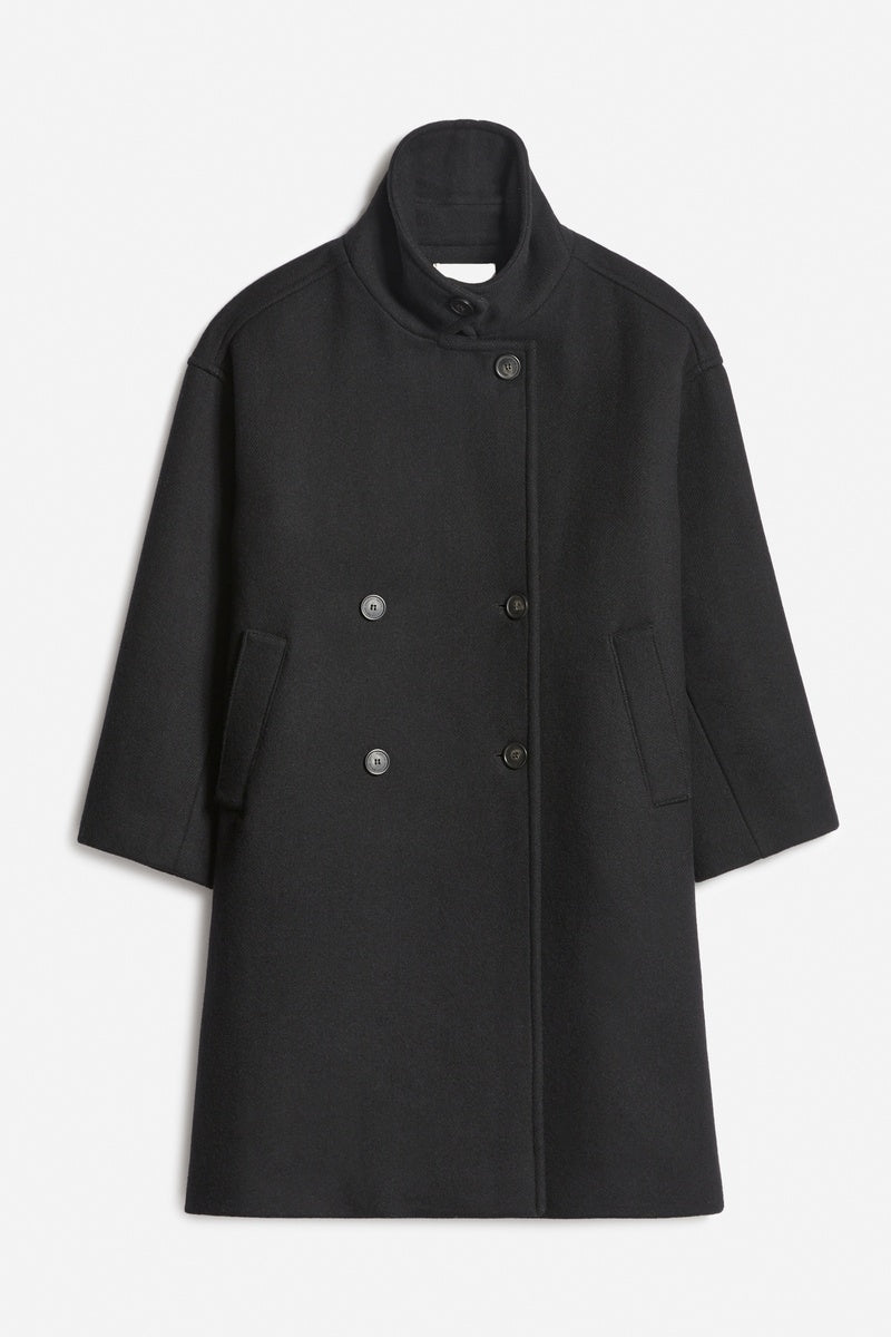 Black coat with buttons on a light gray background