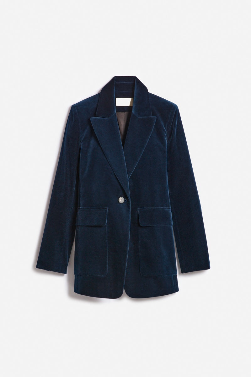 Navy blue velvet blazer on a light gray background