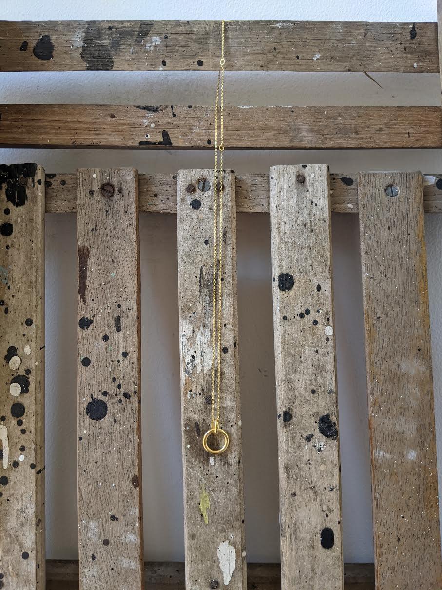 tilly sveaas small eternity ring on gold trace chain necklace