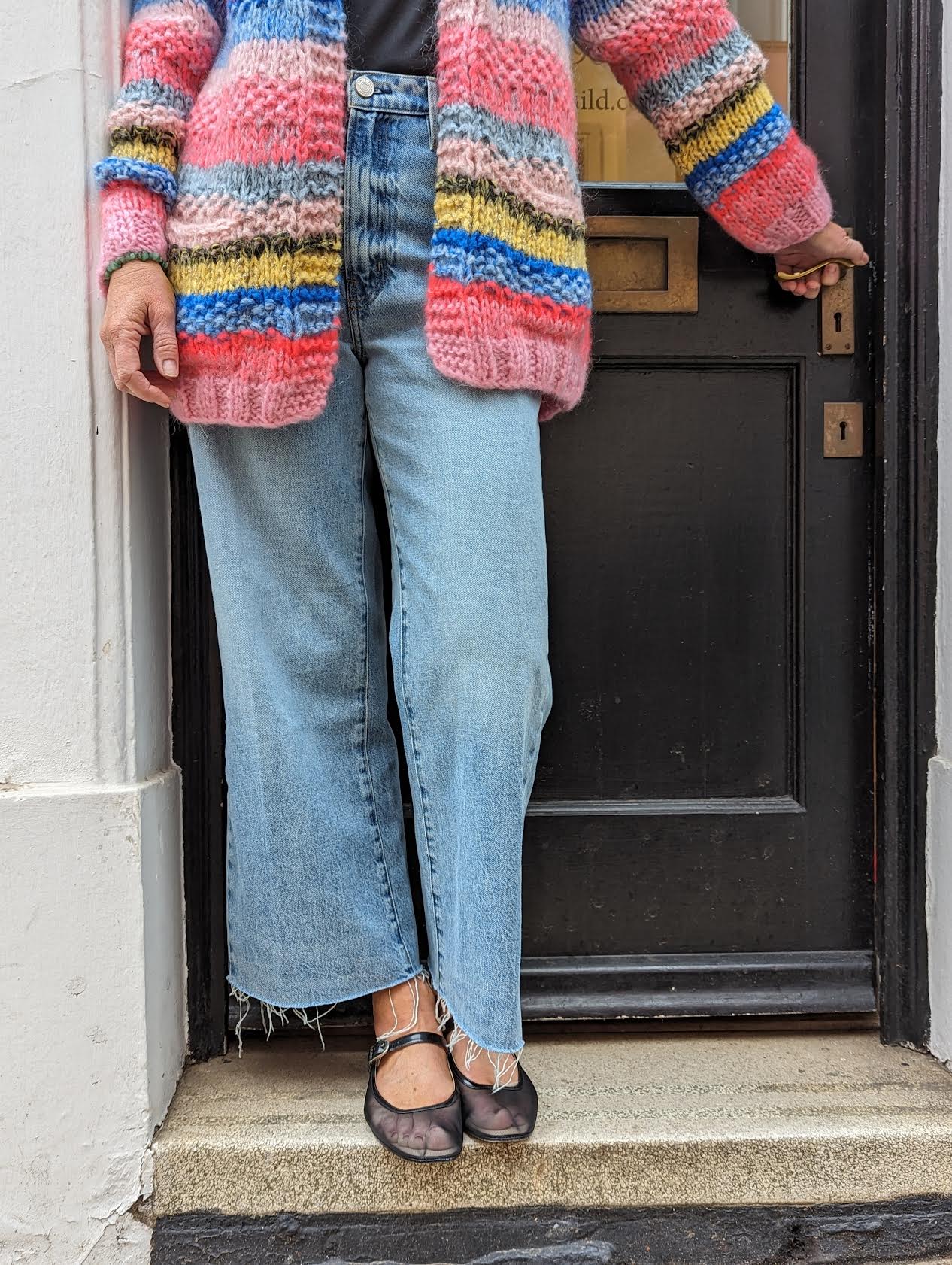 DawnxDare - Mars Pink & Blue Multi-Coloured Cardigan worn with Frame Jeans outside 32 The Guild