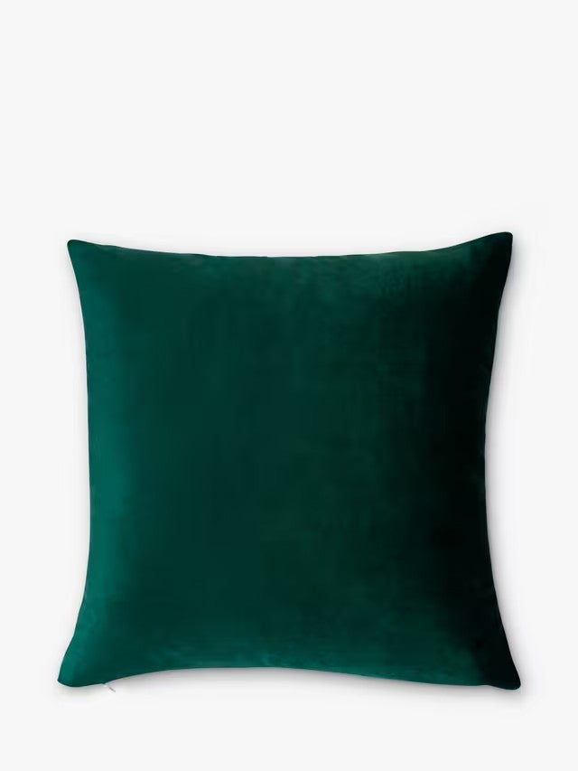 Green pillow on a white background