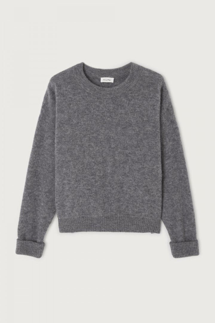 Grey sweater on a light gray background