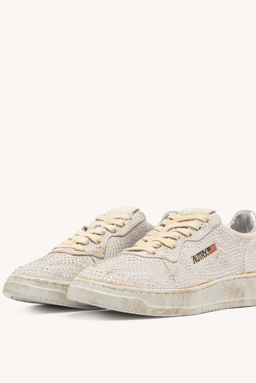 Pair of Autry white sneakers with visible brand logo on a white background