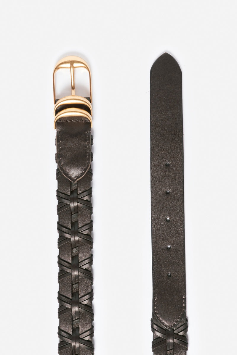 Close up of black leather belt with gold buckle on a white background