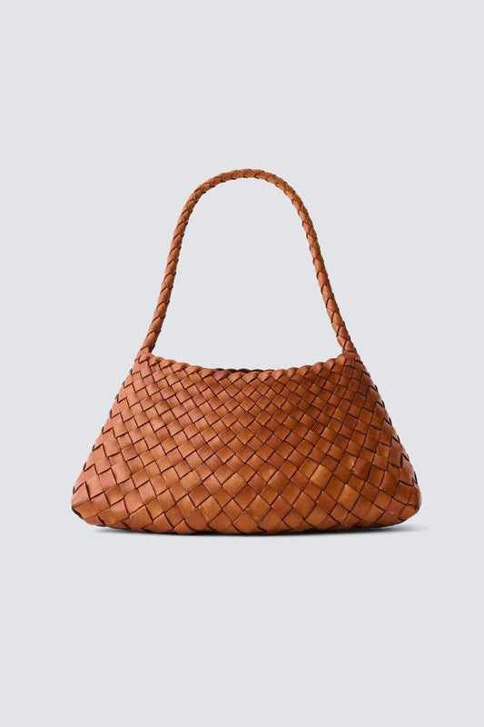 Brown woven handbag on a light gray background