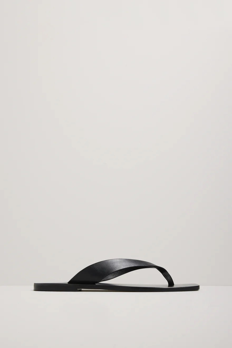 Black sandal on a light gray background