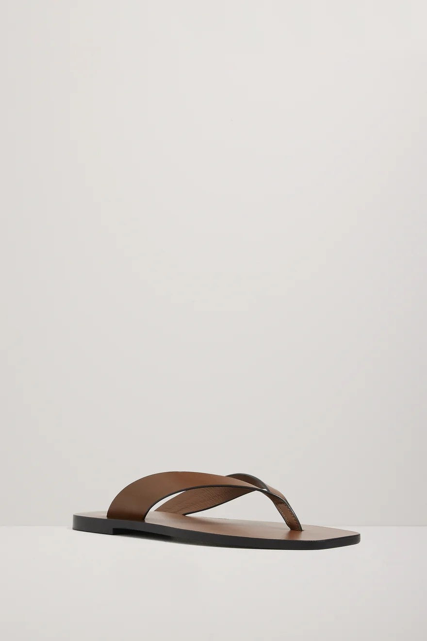 Brown sandal on a white background