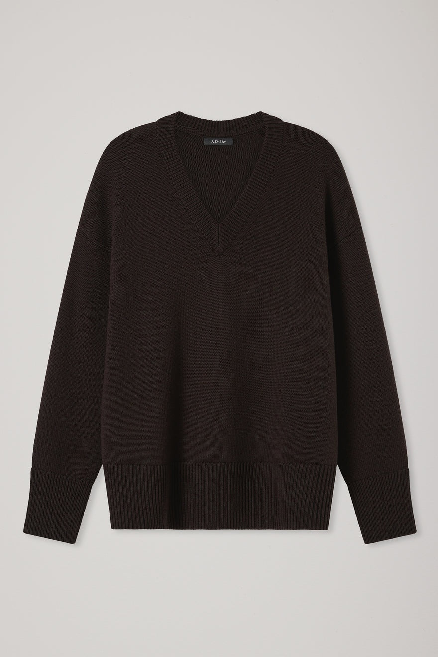 Brown sweater on a light gray background