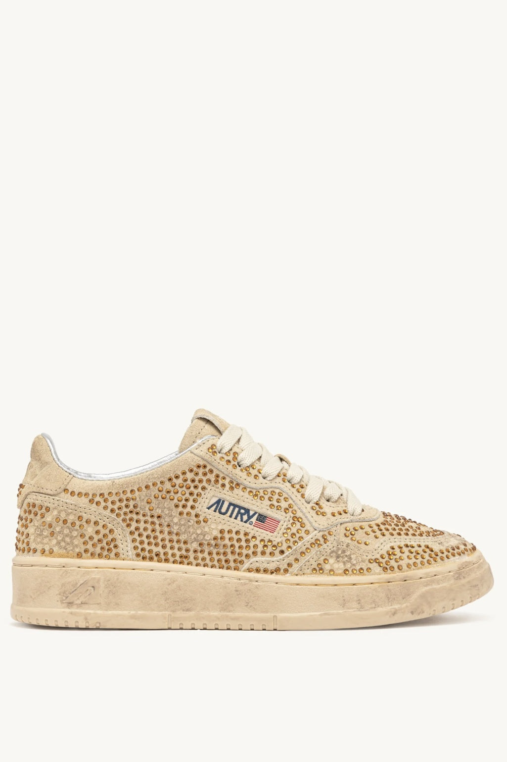 Beige Autry Bloom sneaker with rhinestone embellishments on a white background