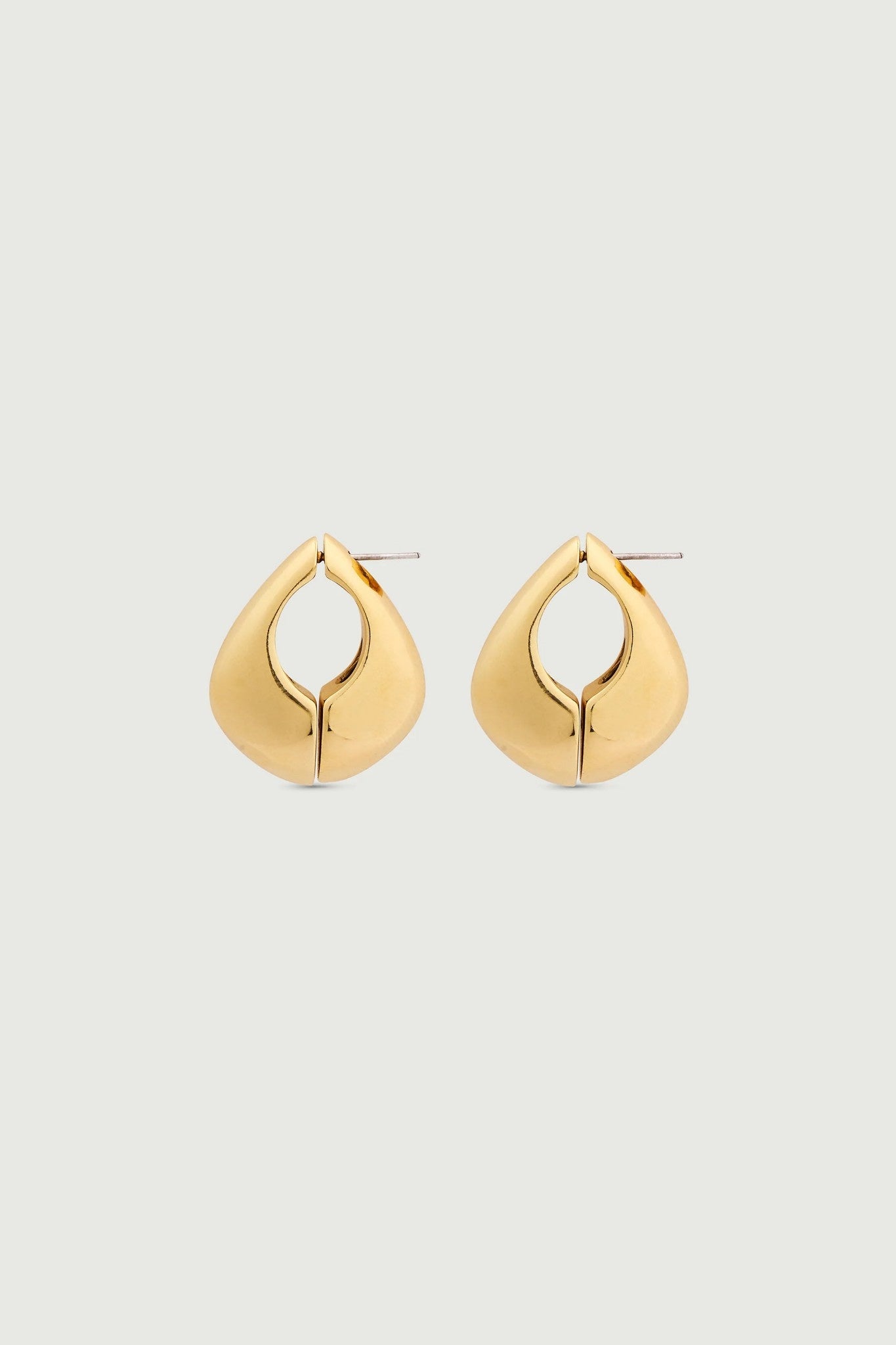 Gold hoop earrings on a white background
