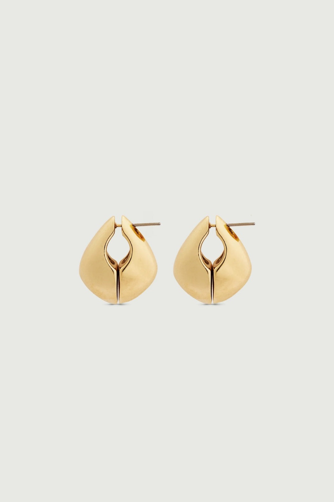 Pair of gold hoop earrings on a light gray background