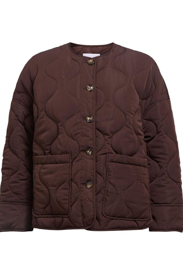 Quilted brown jacket on a white background