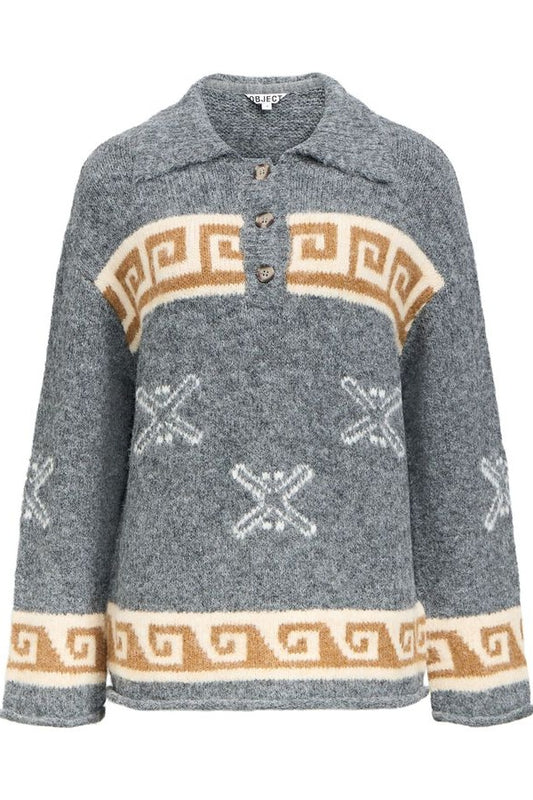 Gray sweater with decorative patterns on a white background