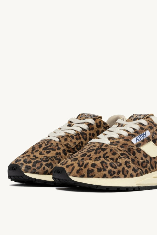 pair of leopard print trainers front profile