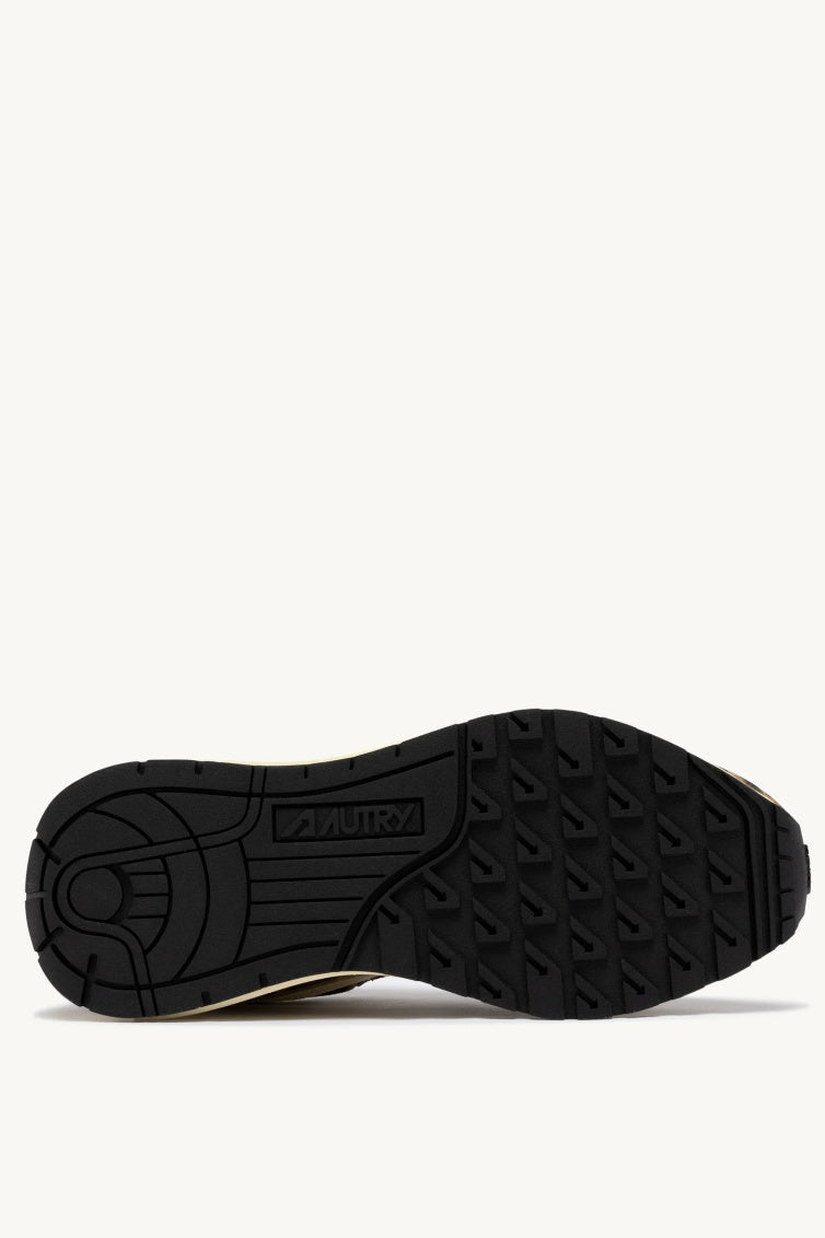 Black shoe sole with brand logo on a white background