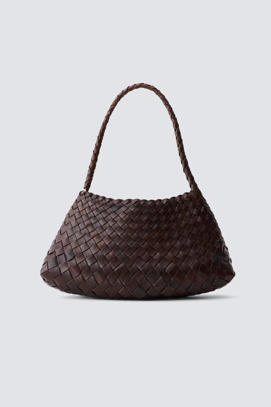 Brown woven handbag on a light gray background