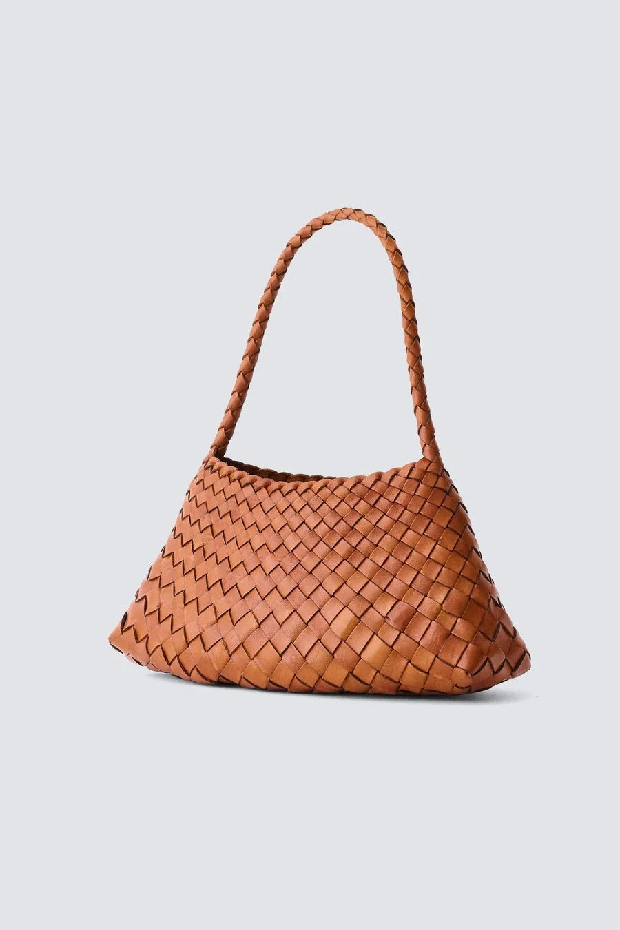 Brown woven handbag on a light gray background