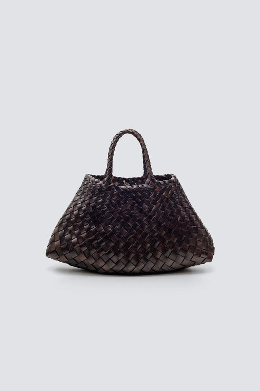 Woven handbag on a light gray background