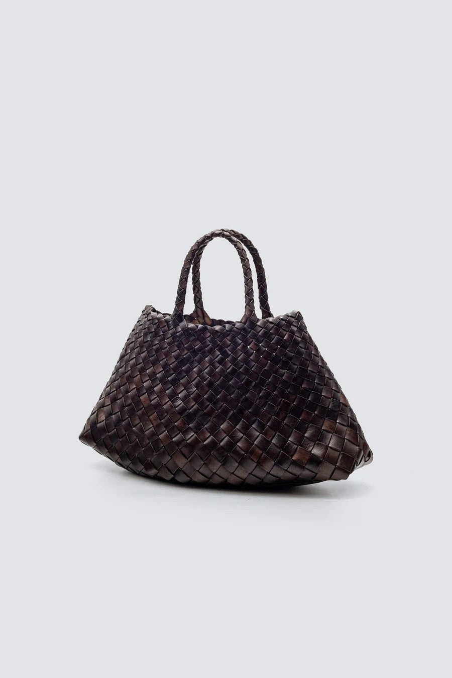 Woven handbag on a light gray background