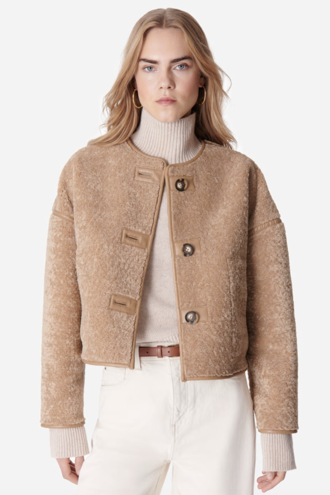 Model wearing the Vanessa Bruno reversible Duomo Jacket - Shearling side.