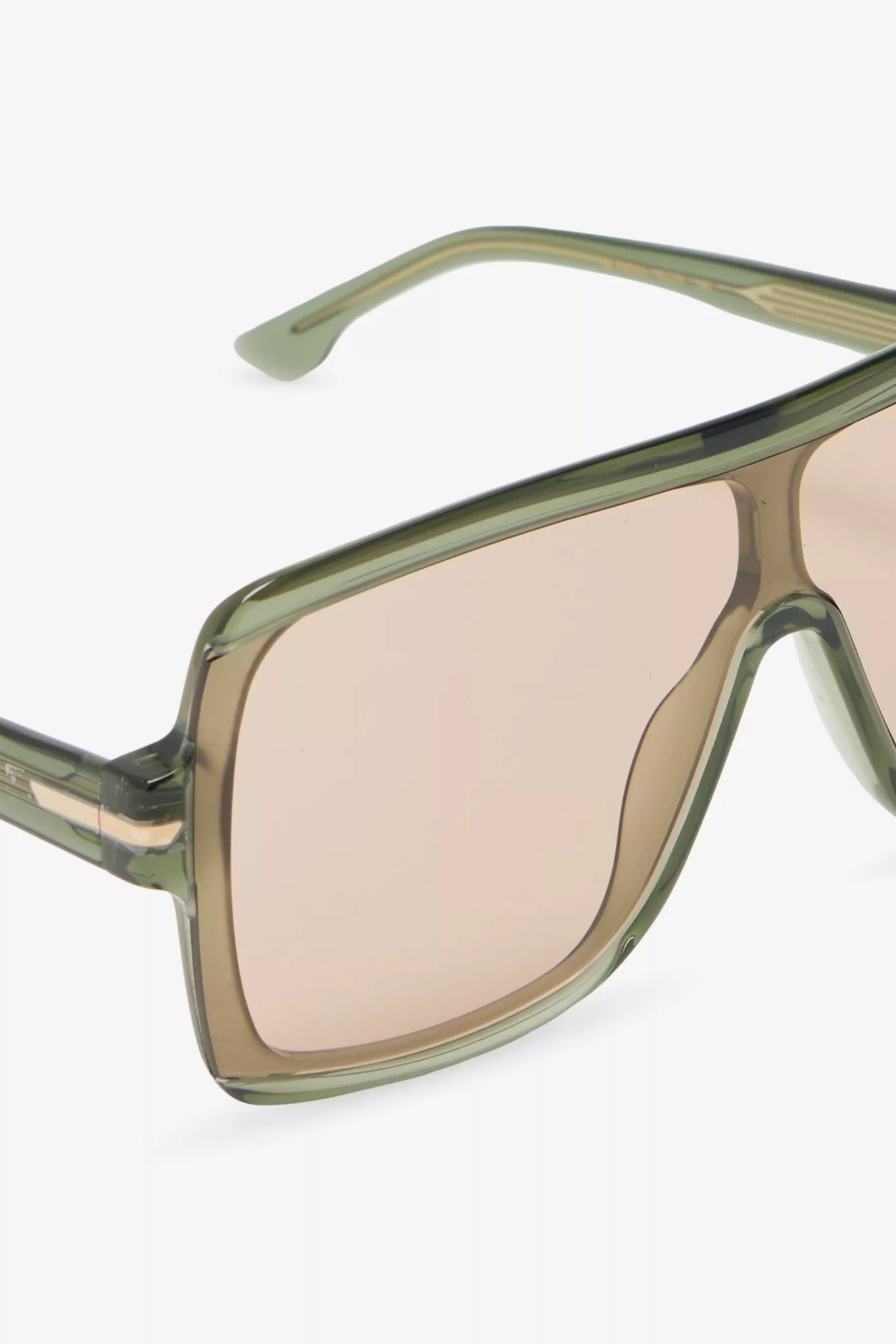 Sunglasses with green frame and beige lenses on a white background