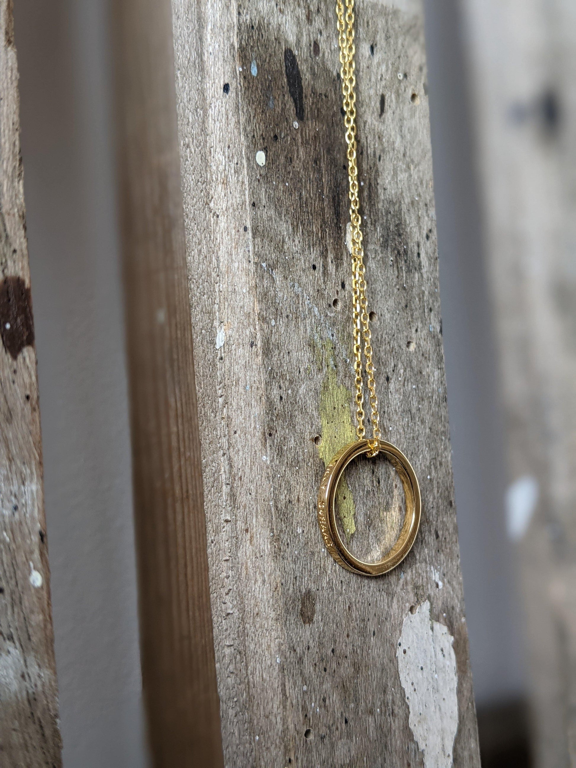 tilly sveaas small gold eternity ring on trace chain necklace